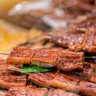 Among Japanese delicacies, unagi stands out: freshwater eel grilled and glazed with a sweet sauce made from soy sauce, mirin, and sugar a rich and refined dish.